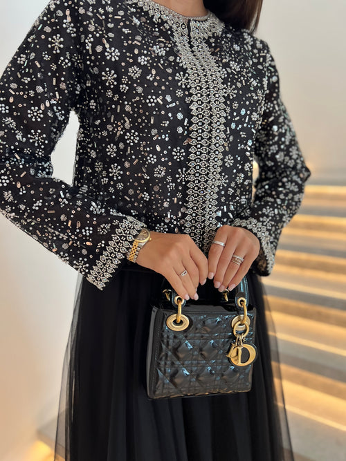 Black top with skirt